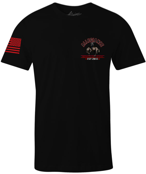 Front of Bucked Graphic Tee in black featuring small Allegiance chest logo and American flag sleeve print.