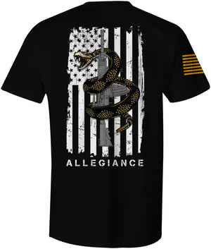Back of Rattler Tee in black showcasing large rattlesnake wrapped around a rifle over a distressed American flag.
